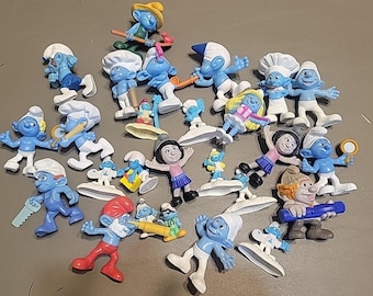 Smurfenfiguurtjes, McDonald's speelgoed, taarttoppers, enz.