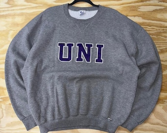 Sudadera vintage de cuello redondo con parche bordado de la marca Russel Athletic UNI, años 90.