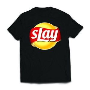 May include: Black t-shirt with a yellow and red logo that says "slay" in a white font.
