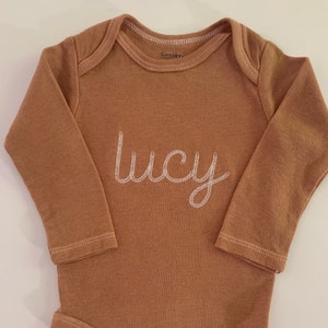 Hand Dyed Caramel color Baby ONESIES® Brand bodysuit, long sleeve personalized embroidered baby bodysuit, Vintage chain stitch font