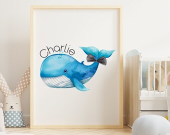 May include: A watercolor illustration of a blue whale with a black bow tie. The whale is swimming to the right and the text "Charlie" is written above it.