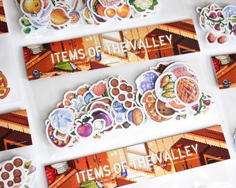 May include: A collection of colorful stickers featuring various food items like pizza, fruit, and vegetables. The stickers are packaged with a header card that reads "ITEMS OF THE VALLEY". The overall theme is a collection of food-related stickers.