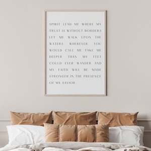Puede incluir: Una impresión enmarcada con fondo blanco y texto negro. El texto dice "Spirit lead me where my trust is without borders. Let me walk upon the waters wherever you would call me take me deeper than my feet could ever wander and my faith will be made stronger in the presence of my savior."