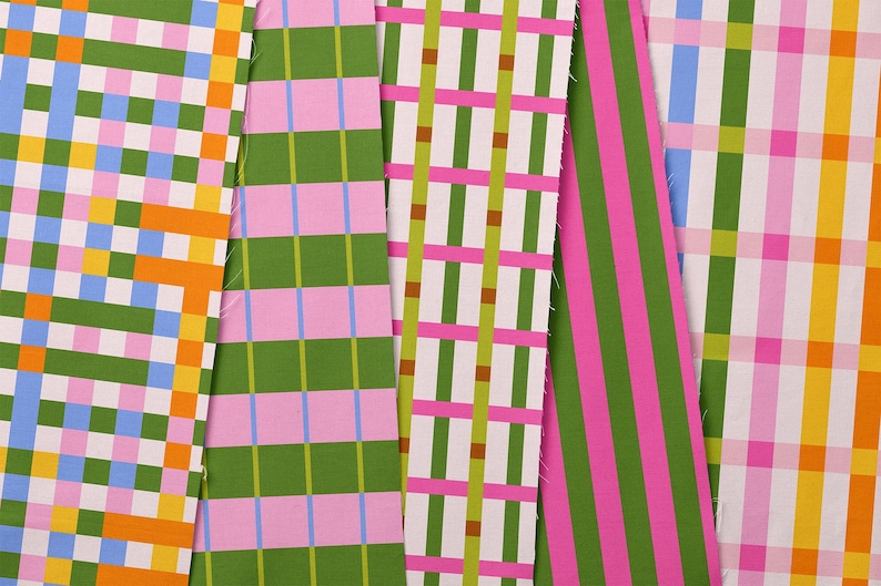 May include: A collection of colorful fabric swatches with various geometric patterns. Designs include plaid, stripes, and grid patterns in shades of green, pink, blue, yellow, and orange. The fabrics are arranged side by side, showcasing the different designs.