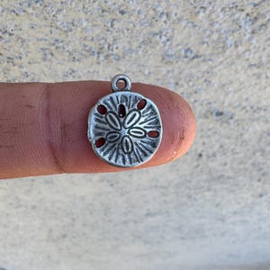 Sand Dollar Charm. Sterling Silver