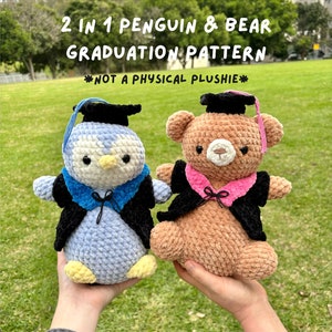 May include: A crocheted penguin and bear plushie wearing graduation attire. The penguin is light blue and white, and the bear is brown. Both have black caps and gowns, with blue and pink accents. Text reads "2 IN 1 PENGUIN & BEAR GRADUATION PATTERN *NOT A PHYSICAL PLUSHIE*"