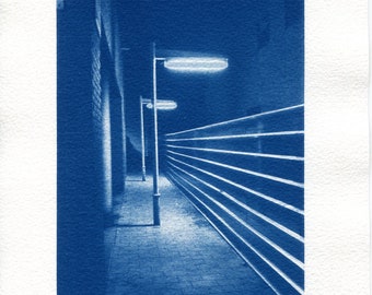 Cyanotype print of streetlights outside an apartment building, from an original photograph. Handmade blue wall art.