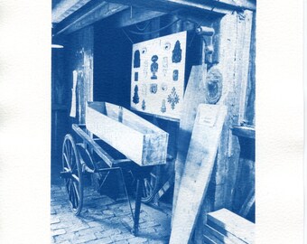 Cyanotype print of a Coffin-maker's workshop, from an original photograph. Handmade blue wall art.