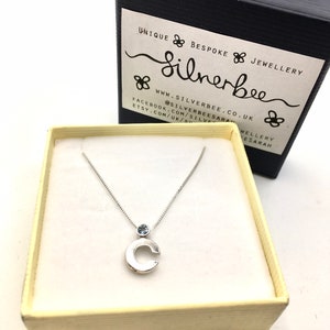 Initial sliding pendant with gemstone