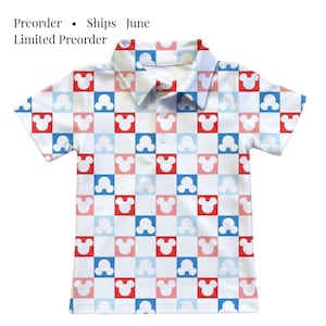 May include: A short-sleeve polo shirt featuring a repeating checkerboard pattern of red, light blue, and white squares, each containing a white Mickey Mouse head silhouette. The shirt has a collar and a three-button placket. Text reads: Preorder &bull; Ships June Limited Preorder.