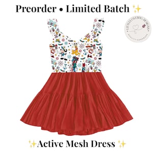 May include: A sleeveless dress with a white bodice featuring a colorful holiday-themed print of Disney characters, anchors, and snowflakes, paired with a solid red, tiered, pleated skirt. The text reads Preorder Limited Batch and Active Mesh Dress.