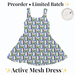 May include: A sleeveless dress featuring a repeating pattern of Buzz Lightyear characters over vertical blue and lime green stripes. The text Preorder Limited Batch and Active Mesh Dress appears with a circular logo featuring a ladybug.