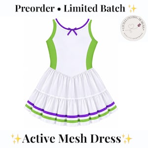 May include: A white sleeveless dress with green side panels and a purple neckline trim featuring a small purple bow. The skirt is white with two horizontal stripes in green and purple at the hem. Text reads Preorder Limited Batch Active Mesh Dress.