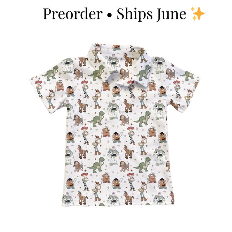 May include: White collared shirt with a pattern of cartoon characters. The shirt features short sleeves and a button-down collar. The text "Preorder &bull; Ships June" is at the top of the image.