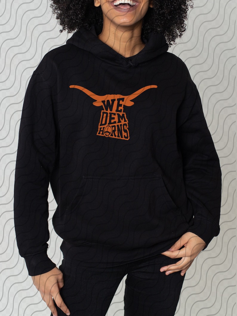 May include: Black hoodie with an orange graphic of a longhorn steer head with the text "WE DEM HORNS".