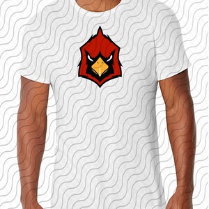 Op de afbeelding: Wit T-shirt met een rode kardinaalskop-afbeelding. De kardinaal heeft een zwarte snavel en gele ogen.