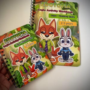 May include: Two spiral-bound workbooks with the title "Zootopia Logic Activity Workbook." The covers feature cartoon characters of a fox and a rabbit. The workbooks are designed for children aged 2-5 years old. The text "Logic + Thinking Skills" is also visible.