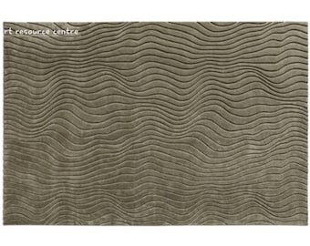 May include: A soft, plush rug with a wavy, textured pattern in a muted gray color.