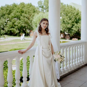 Elegant Satin Corset Wedding Dress with Bow Straps: Modern, Minimalist | Custom Fit Bridal Gown with Train | Perfect for Romantic Weddings