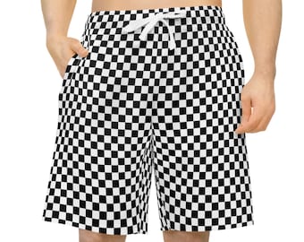 Könnte beinhalten: Schwarz-weiße karierte Shorts mit einem Kordelzug.
