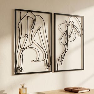 Female body metal wall art