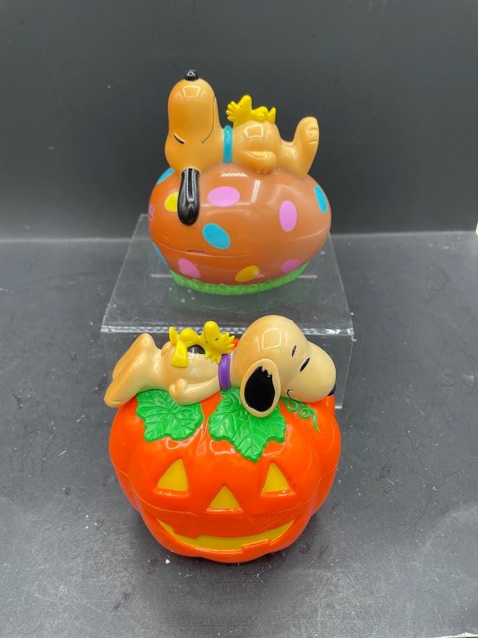 Lot of 2 Vintage Snoopy Easter Halloween Doghouse Bank Whitmans