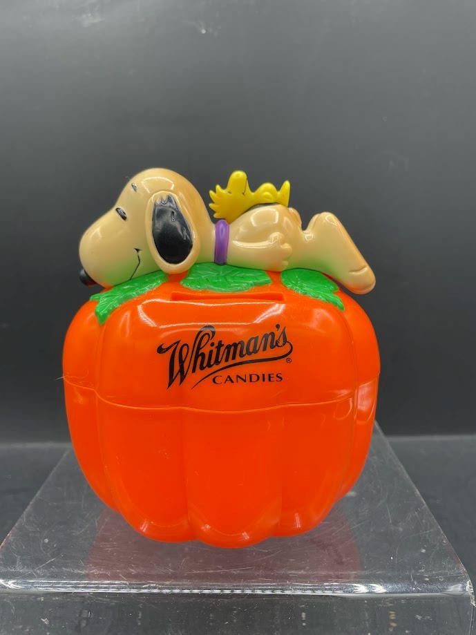 Lot of 2 Vintage Snoopy Easter Halloween Doghouse Bank Whitmans
