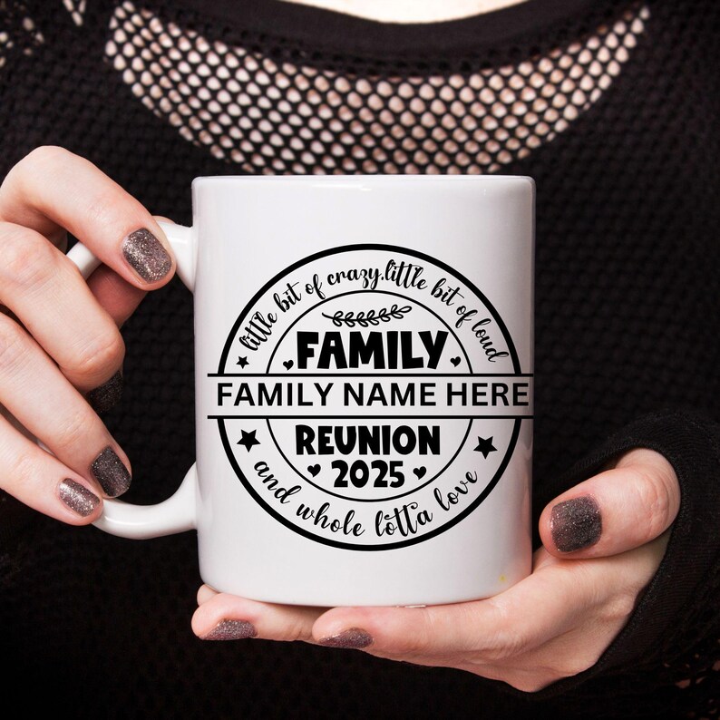 May include: White ceramic mug with a black circle design that says "little bit of crazy, little bit of loud, FAMILY, FAMILY NAME HERE, REUNION 2025, and whole lotta love".