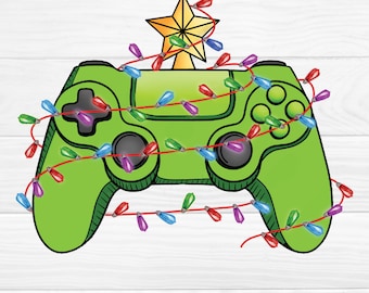 May include: A green video game controller with a star on top and red, green, blue, and purple Christmas lights wrapped around it.
