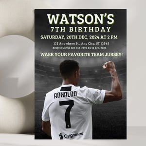 May include: A black and white birthday invitation with a soccer player wearing a white jersey with the number 7 and the name "RONALDO" on the back. The invitation says "WATSON'S 7TH BIRTHDAY" and includes the date, time, and location of the party. It also says "WAER YOUR FAVORITE TEAM JURSEY!"