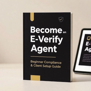 May include: A black book and a tablet display the text "Become an E-Verify Agent." The book, with gold accents, includes "Beginner Compliance & Client Setup Guide." The tablet, on a stand, mirrors the book's title. The background is a neutral beige.