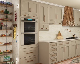 May include: A modern kitchen with light gray cabinets, a white countertop, and a central island with a microwave. The kitchen features a double oven, a decorative range hood, and a window with natural light. The floor is made of wood.