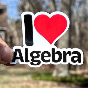 May include: A white sticker with black text that says "I love Algebra" and a red heart.