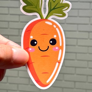 May include: A cartoon carrot with a happy face and green leafy top. The carrot is orange and has a white outline.