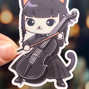 May include: A black and white cartoon cat wearing a black dress and playing a cello. The cat has orange ears and a white face.