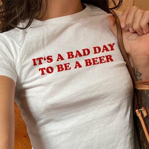 It's A Bad Day to Be a Beer Baby Tee, Fourth of July Shirt, Trendy Summer Graphic Tee, USA Party Shirt, Lake Day Crop Top
