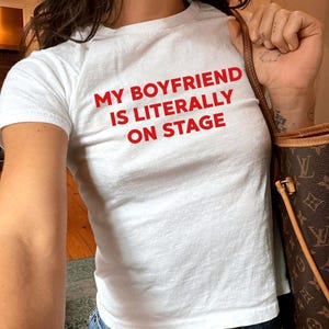 My Boyfriend Is Literally On Stage Baby Tee, Y2K Concert Tee, Rockstar Girlfriend Shirt, Singer Baby Tee, Funky Graphic Top