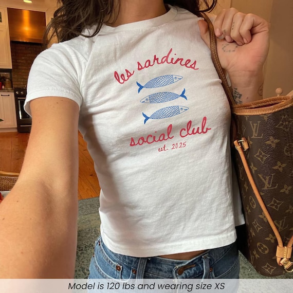 Les Sardines Social Club Baby Tee, Tinned Fish T-Shirt, Portugal Travel Gift, Vintage Sardine Coastal Aesthetic Fish Baby Tee