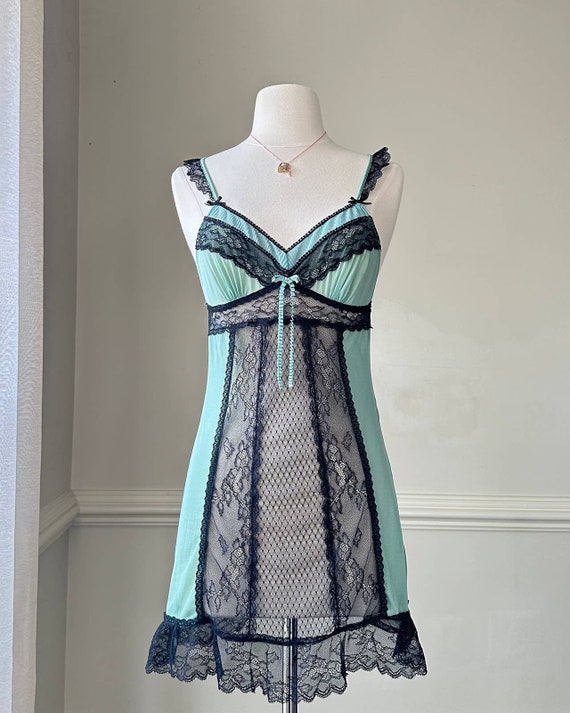 mint dress with black lace Kivary Women's Black Lace and Mint-Blue Short Knee Length Corset Tulle Prom Homecoming Party Dresses US 2 at Amazon Women's Clothing store