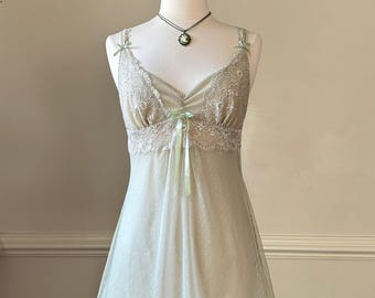 Complete sheer sage green mesh slip dress featuring floral embroidery bodice