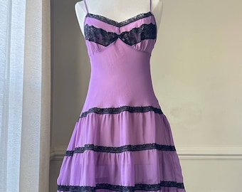 Vibrant purple midi dress featuring black lace lining