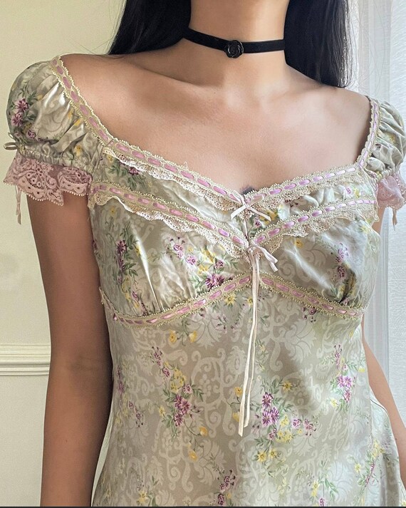 Sage green Victorian inspired midi dress featuring vi… Gem