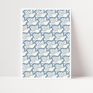 May include: A blue and white print featuring a repeating pattern of stylized doves. The doves are white with blue outlines and are arranged in a geometric pattern.