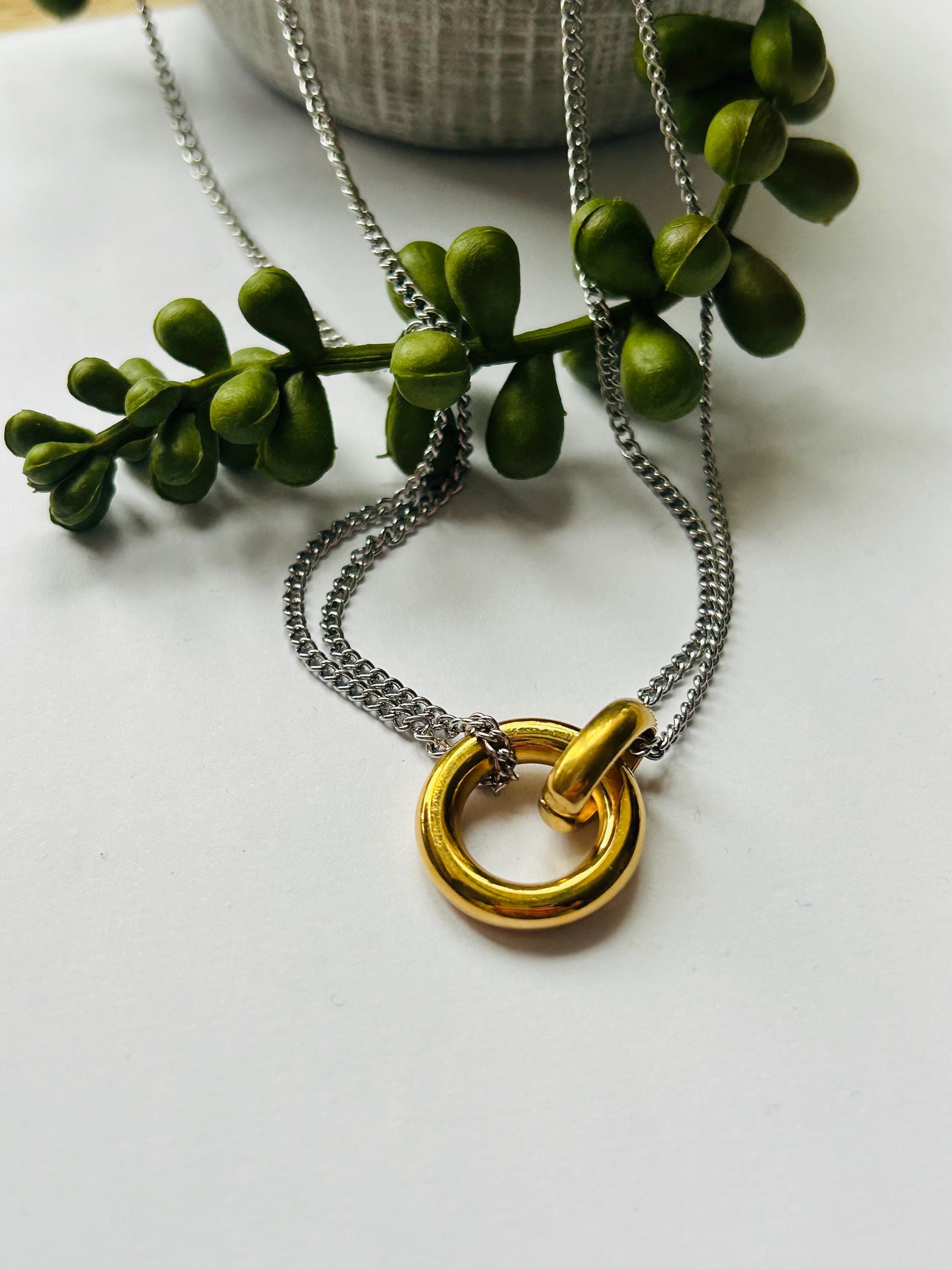 la fusion toit arrivée collier anneaux entrelacés signification surligner Bruyan