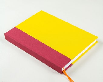 hand-bound lined notebook, yellow & maroon