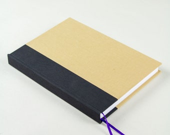 hand-bound lined notebook, tan & black