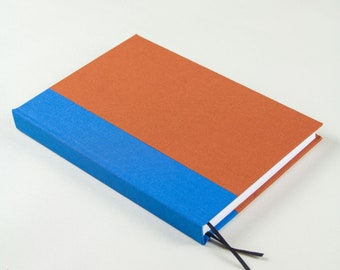 hand-bound lined notebook, rust & blue