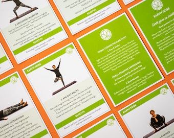 May include: Green and orange illustrated cards with text and images of yoga poses. The cards feature the text "Earth Tribe" and the names of different yoga poses, such as "Grounded Warrior" and "Ancient Roots".