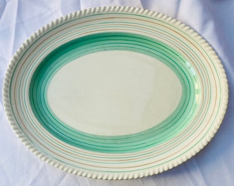 Grays Pottery, display platter with pink and green banding and fluted edging