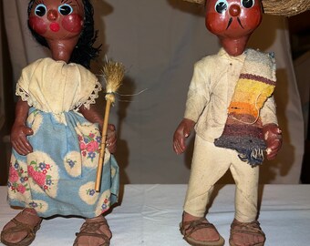 Vintage paper mache dolls